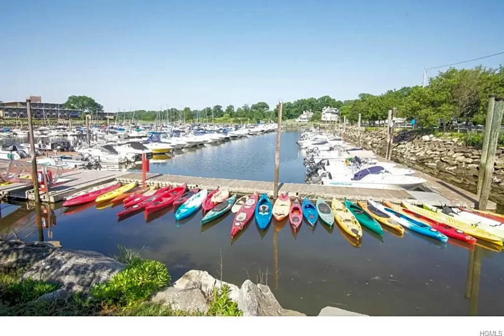 A bunch of boats are parked on the dock